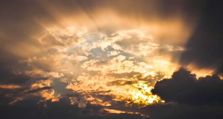 Clouds sun pxby Clouds with sunburst - Belize